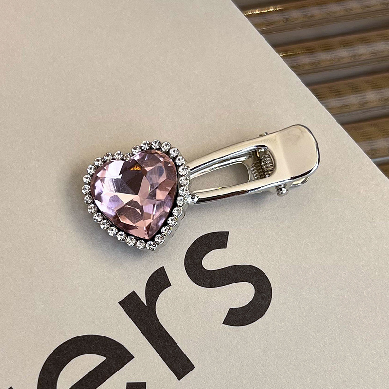 Боковая заколка с розовым стразами в виде сердца