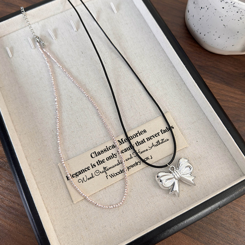 Collana con Fiocco Metallico Argento