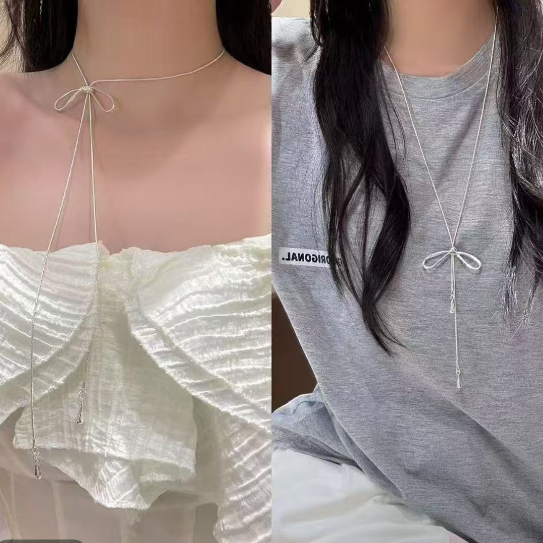 Срібне регульоване намисто з бантом