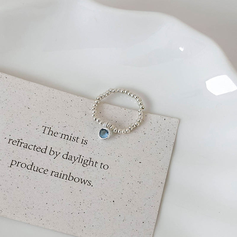 Синій еластичний перстень з кришталевими намистинами