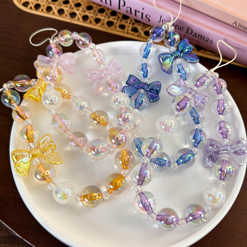 سلسلة هاتف مطرزة بشرائط