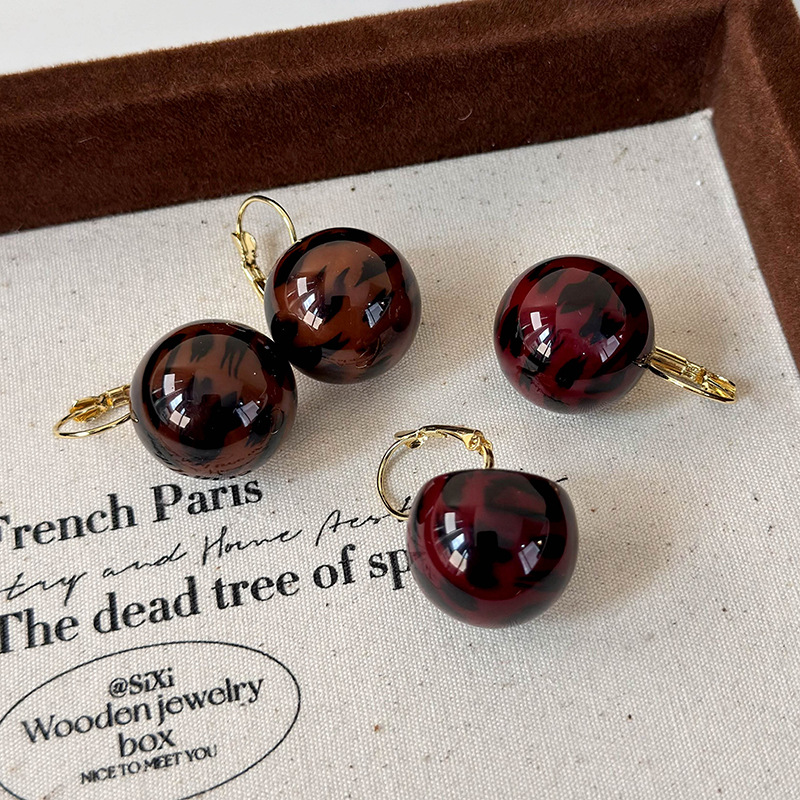 Сережки-кульки з леопардовим принтом