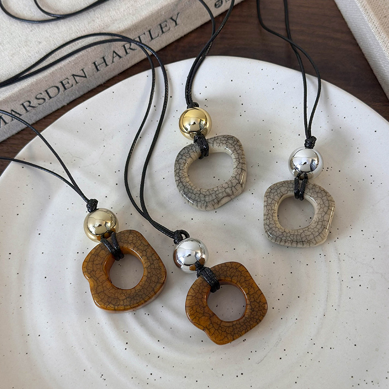 สร้อยคอเครื่องประดับกระดูกอูฐเรขาคณิต