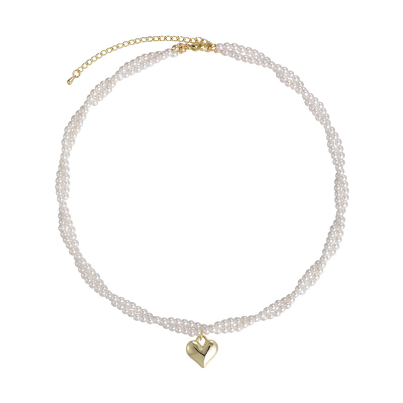 Подвійний намисто-чокер з перлами у вигляді скрученого серця