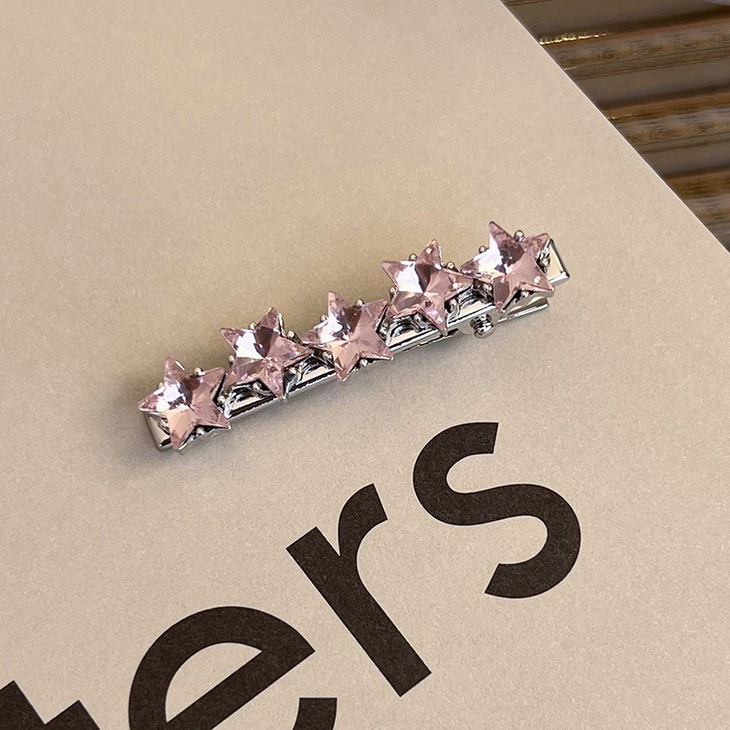 Боковая заколка с розовым стразами в виде сердца