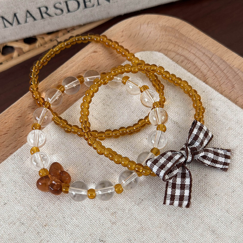 Σύνολο Ρυθμιζόμενων Βραχιόλιων με Χάντρες και Φιόγκο