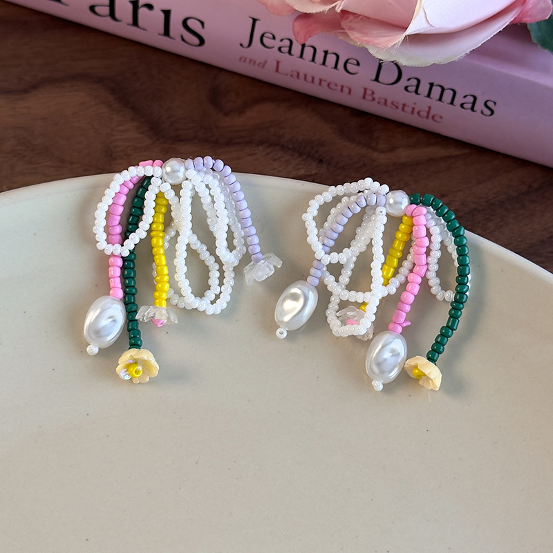 Orecchini a Fiocco e Nappe con Perline