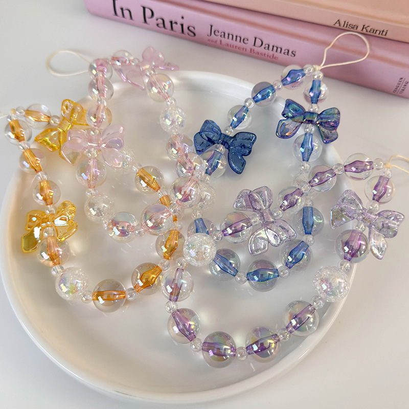 سلسلة هاتف مطرزة بشرائط