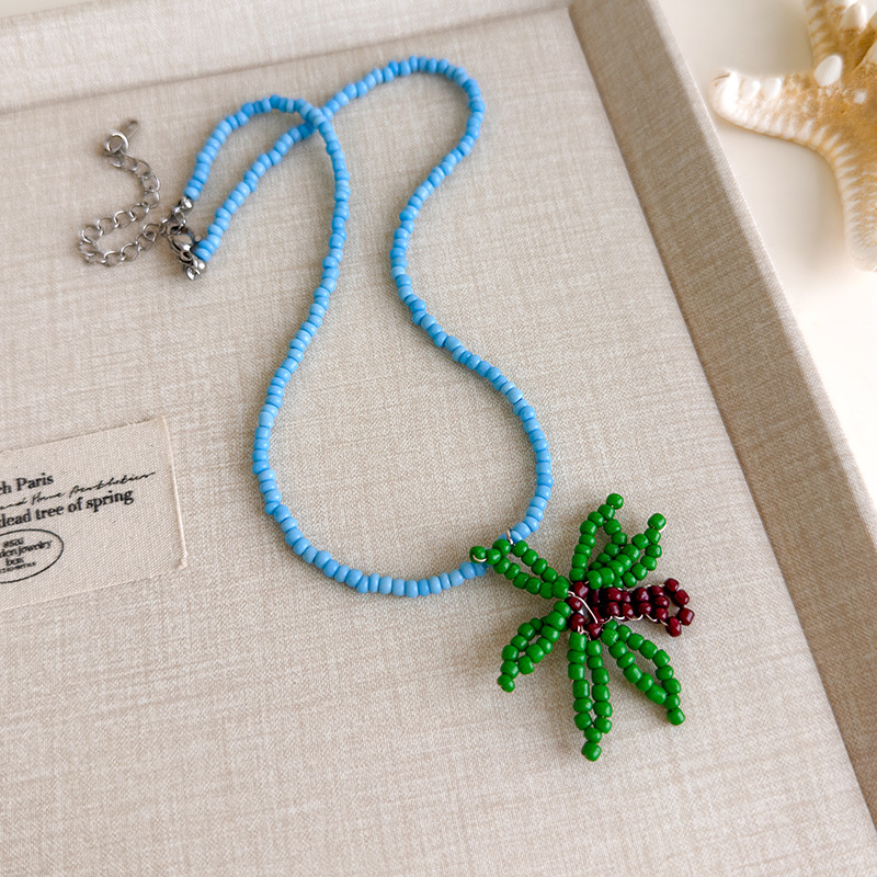 Блакитне намисто з мушлями та намистинами