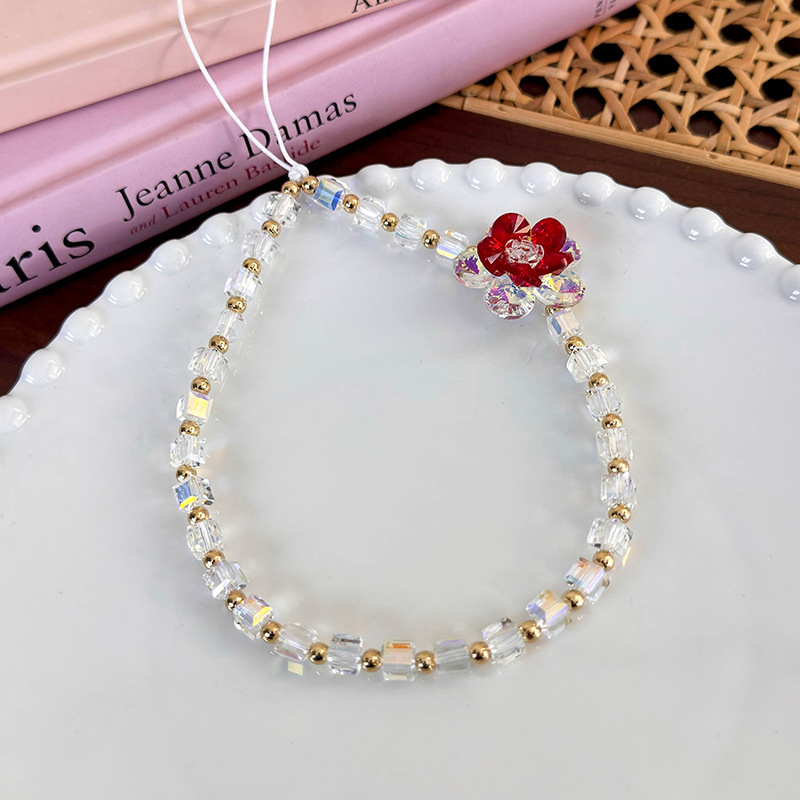 سوار هاتف مع زهرة خرز زجاجي