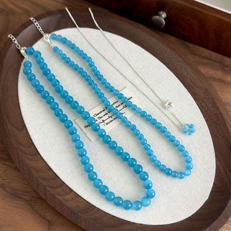 Багатошарове намисто з блакитною котячим оком квітки