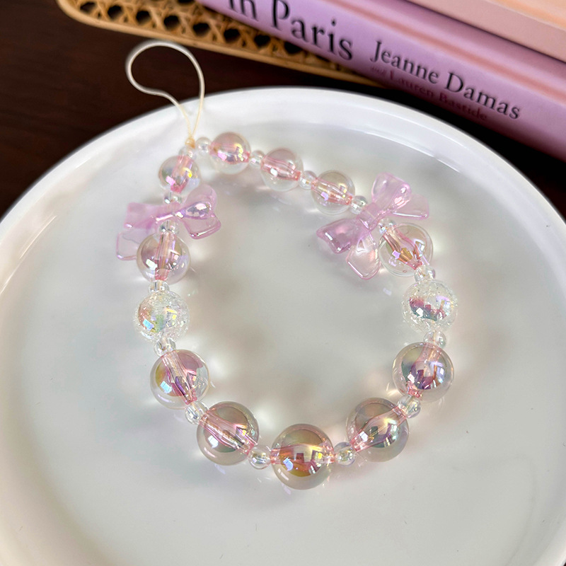 سلسلة هاتف مطرزة بشرائط