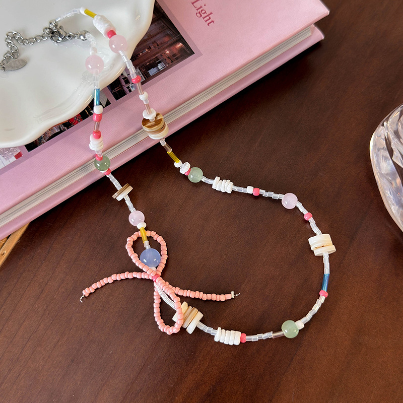 สร้อยคอแพนด้นต์โบว์และเปลือกหอย